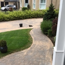 Sand, Sealed and Delivered a complete driveway and patio cleaning transformation